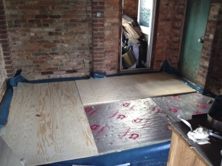 Insulation down, plywood next
