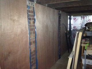 Plywood walls going up